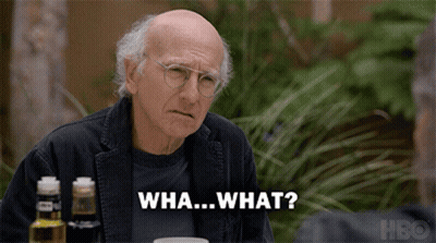 An Older Man Sitting At A Table With A Bottle Of Hbo On The Table GIF