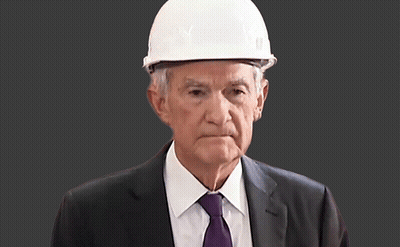 An Older Man Wearing A Hard Hat And A Suit GIF