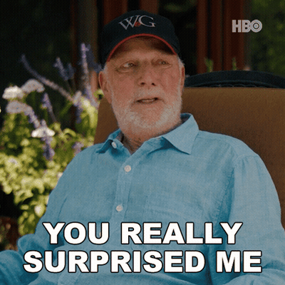 An Older Man Wearing A Hat That Says Wg Is Sitting In A Chair And Says You Really Surprised Me GIF
