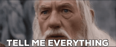 An Older Man With A Beard And Mustache Says Tell Me Everything GIF