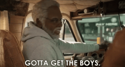 An Older Man With A Beard Is Driving A Van And Saying `` Gotta Get The Boys '' . GIF