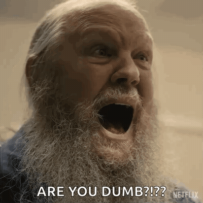An Older Man With A Beard Is Screaming With His Mouth Open And Asking Are You Dumb ? GIF