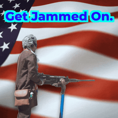 An Older Woman Holding A Gun In Front Of An American Flag With The Words Get Jammed On GIF