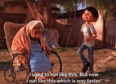 An Older Woman In A Wheelchair Is Talking To A Young Boy Who Is Running GIF