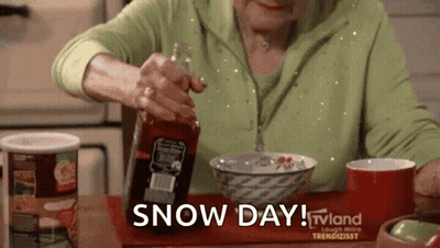 An Older Woman Is Sitting At A Table With A Bowl Of Cereal And A Bottle Of Sauce . GIF
