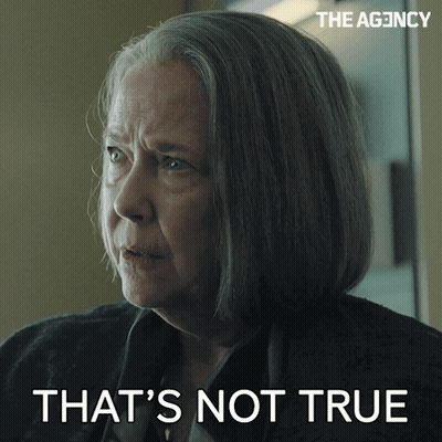 An Older Woman Says That 'S Not True In Front Of A Picture Of Her GIF