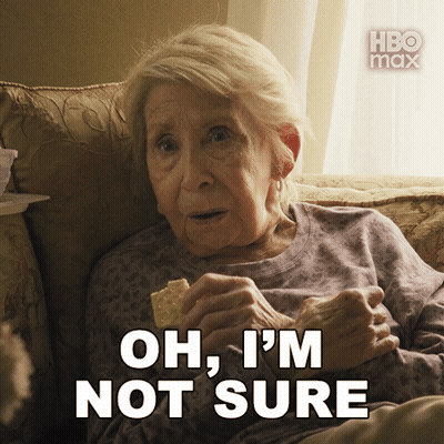 An Older Woman Sitting On A Couch Eating Chips With The Words Oh I 'M Not Sure Behind Her GIF