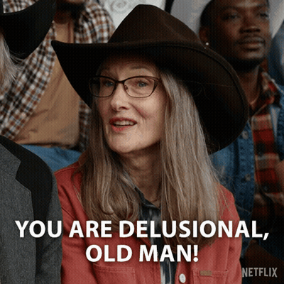 An Older Woman Wearing A Cowboy Hat And Glasses Says You Are Delusional Old Man GIF