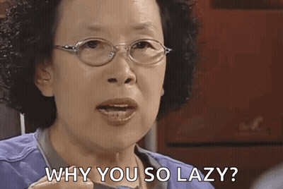 An Older Woman Wearing Glasses Is Asking Why You So Lazy ? GIF