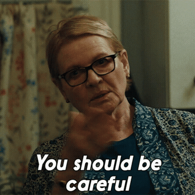 An Older Woman Wearing Glasses Says " You Should Be Careful " GIF