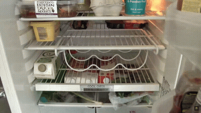 An Open Refrigerator With A Carton Of Shredded Hoisin Duck Noodles On Top GIF