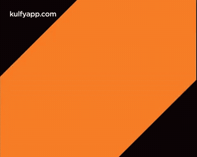 An Orange And Black Wicke Logo With A Cricket Ball In The Middle GIF