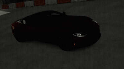 An Orange Sports Car With A Black Top Is Driving Down A Road GIF