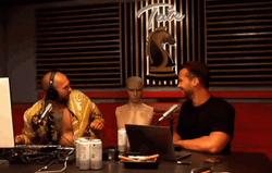 Andrew Tate Punching Dummy On Podcast GIF