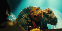 Angel Reese Ninja Turtle Eating GIF
