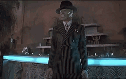 Anger State Of The Mask While Holding Guns GIF