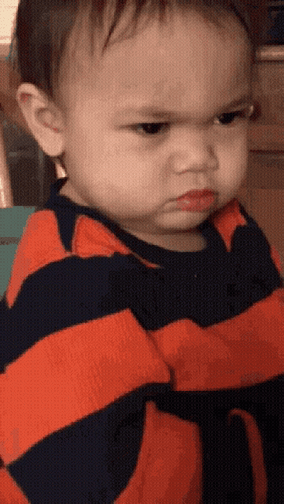Angry Baby With Arms Crossed Saying Im Jealous GIF
