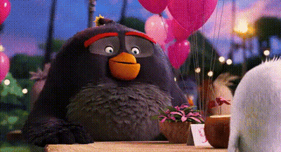 Angry Bird Sitting At Table With Pink Balloons GIF
