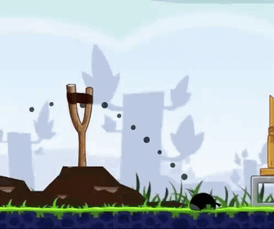 Angry Birds Game With Slingshot In Field GIF