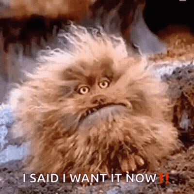 Angry Furry Animal Sitting On Ground GIF