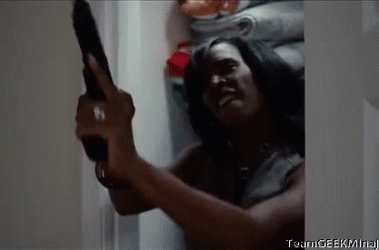 Angry Lady Loading Gun GIF