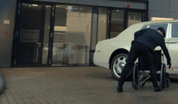 Angry Man Kicking Wheelchair GIF