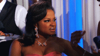Angry Woman In Pink Dress With Earrings GIF