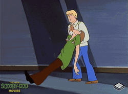 Animated Fred Pushing Passed Out Shaggy GIF