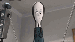 Animated Wednesday Adams Pointing At Someone GIF