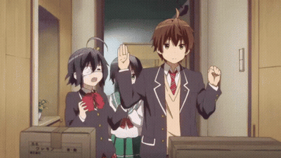 Anime Characters High-Fiving In Room With Boxes GIF