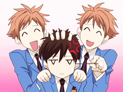Anime Characters Playing With Boy's Hair, One Making Face GIF