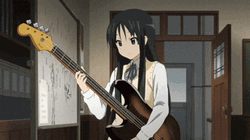 Anime Mio Akiyama Getting Caught Hugging A Guitar GIF