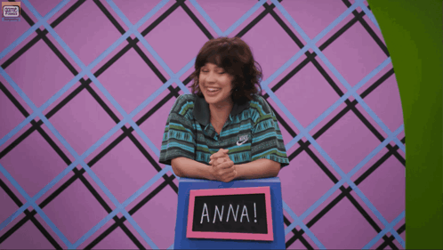 Anna Says We 'Re Being Bad In Front Of A Colorful Background GIF