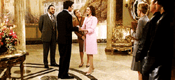 Anne Hathaway Stepping On Man's Foot GIF