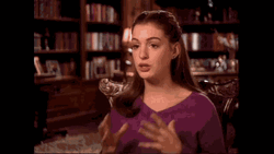 Anne Hathaway Touching Her Ear GIF