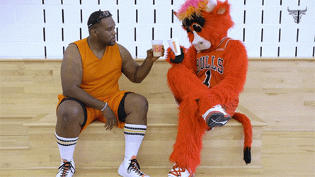 Anthony Adams Drinking With A Mascot GIF