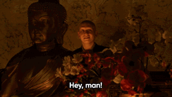 Anthony Carrigan Standing Beside Buddha Gulp GIF