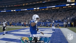 Anthony Richardson Flexing Biceps After Touchdown GIF