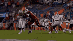 Anthony Richardson Jumping Over Opponent GIF