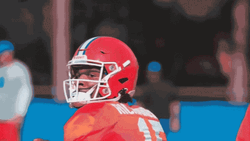 Anthony Richardson Tossing Football GIF
