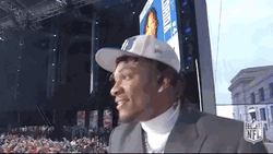 Anthony Richardson Waving To Audience From Stage GIF