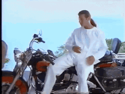 Antonio Banderas Long Haired Big Bike GIF