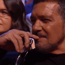 Antonio Banderas Shy Grin Clapping GIF
