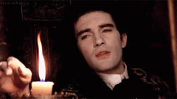 Antonio Banderas Touching The Candle Fire GIF