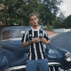 Antony Dos Santos Leaning Back On A Car GIF