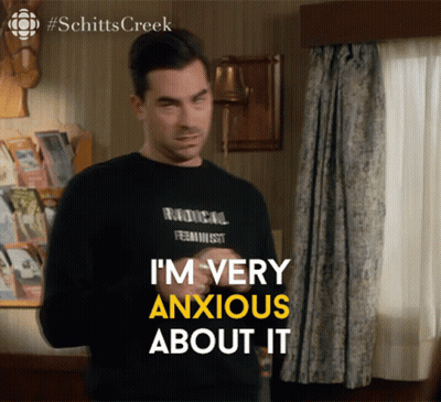 Anxious Man In Black Shirt Saying Radical Feminist GIF