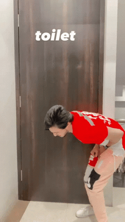 Anxious Man Waiting Outside Toilet GIF
