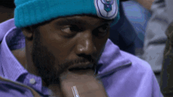Anxious Randy Moss Watching On Sideline GIF