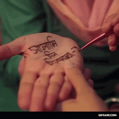 Applying Henna On Hand GIF