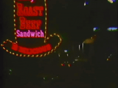 Arby's Roast Beef Sandwich Sign Lit Up At Night GIF
